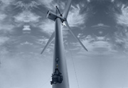 A gearbox is lifted up a wind turbine