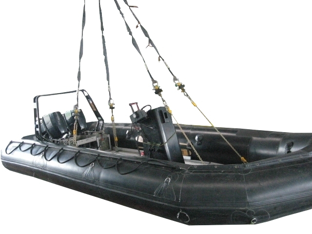Inflatable speedboat with 4 chains ready for rapid transport under a helicopter
